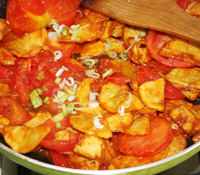 西红柿炒土豆片怎样做