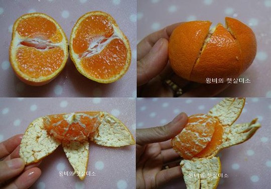 橘子 竖着切成两半 再用刀把皮划成三片 再用手去剥 ,底部要留一半不
